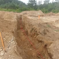 Land drainage trenching and installation in Grey County Ontario