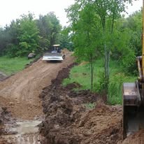 Site Grading and Leveling Professional site grading with heavy equipment in Grey County Ontario