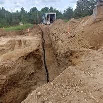 Tile Field Installation Tile field installation and drainage trenching in Grey County Ontario